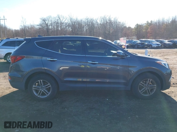 2017 Hyundai Santa Fe 2.4L with VIN 5XYZTDLB0HG453575, listed as a IAAI auction lot 41036334 with 114,031 mi miles and . Bid and sale history available at DreamBid. Image 13.