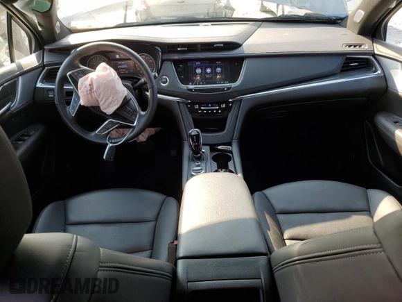 2023 Cadillac XT5 AWD Premium Luxury with VIN 1GYKNDR40PZ152982, listed as a Copart auction lot 69569914 with 24,829 mi miles and Salvage Title. Bid and sale history available at DreamBid. Image 8.
