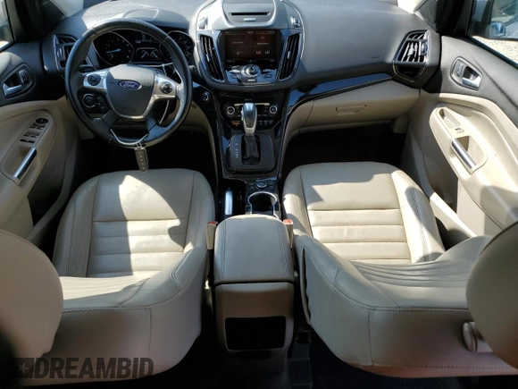 2015 Ford Escape Titanium with VIN 1FMCU0J93FUA58325, listed as a Copart auction lot 64135685 with 126,356 mi miles and Salvage title. Bid and sale history available at DreamBid. Image 8.