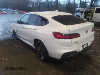 2020 BMW X4 M40i with VIN 5UX2V5C04L9C04255, listed as a IAAI auction lot 41574802 with 35,101 mi miles and . Bid and sale history available at DreamBid. Image 3.