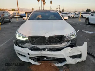 2019 BMW M5 z VIN WBSJF0C53KB284878, wystawiony jako Copart lot #86763564 z przebiegiem Nie podano mil oraz Szkoda całkowita • Salvage title. Historia ofert i sprzedaży dostępna na DreamBid. Obrazek 5.