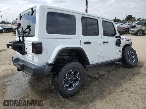 2023 Jeep Wrangler Rubicon with VIN 1C4HJXFG3PW691724, listed as a Copart auction lot 50985745 with 32,377 mi miles and Salvage title. Bid and sale history available at DreamBid. Image 3.