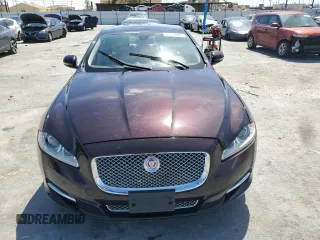2014 Jaguar XJ with VIN SAJWA1CZ3E8V69877, listed as a Copart auction lot 51520405 with 57,567 mi miles and Clean Title. Bid and sale history available at DreamBid. Image 5.