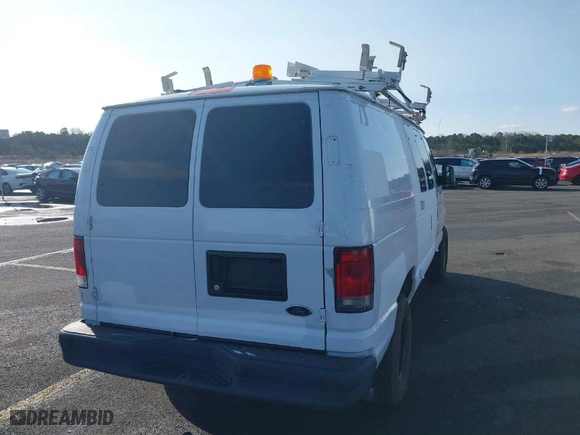 2014 Ford Econoline Cargo Van Commercial with VIN 1FTNE2EL7EDB13904, listed as a IAAI auction lot 41878872 with 145,251 mi miles. Bid and sale history available at carsss.com. Image 4.