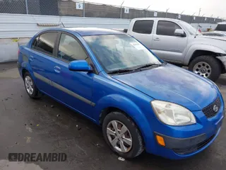 2008 Kia Rio LX with VIN KNADE123486365738, listed as a IAAI auction lot 41902367 with 248,194 mi miles. Bid and sale history available at carsss.com. Image 1.