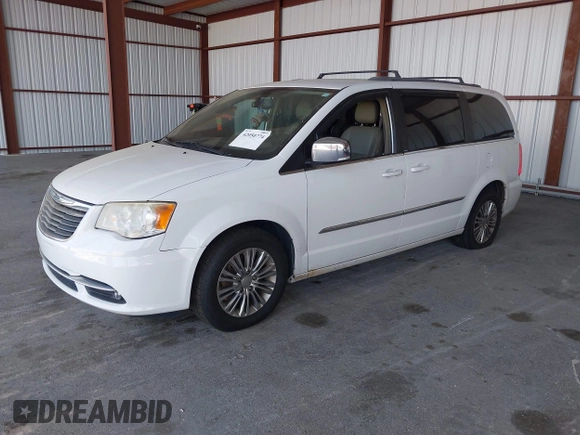 2014 Chrysler Town & Country Touring-L with VIN 2C4RC1CG2ER312444, listed as a IAAI auction lot 42050774 with 124,010 mi miles. Bid and sale history available at carsss.com. Image 18.