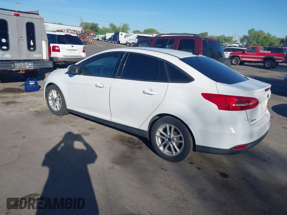 2015 Ford Focus SE with VIN 1FADP3F25FL282916, listed as a IAAI auction lot 42099759 with 152,445 mi miles. Bid and sale history available at carsss.com. Image 3.