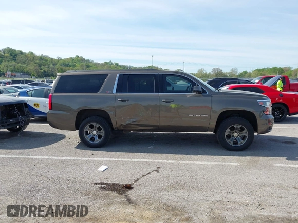 2016 Chevrolet Suburban LT z VIN 1GNSKHKC2GR289761, wystawiony jako IAAI lot #42086912 z przebiegiem 247 791 mil mil oraz . Historia ofert i sprzedaży dostępna na DreamBid. Obrazek 13.