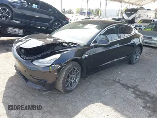 2019 Tesla Model 3 Mid Range with VIN 5YJ3E1EA1KF410297, listed as a IAAI auction lot 41841991 with 176,254 mi miles. Bid and sale history available at carsss.com. Image 17.