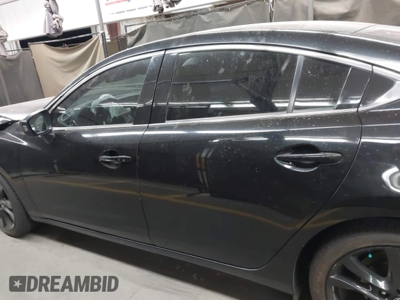 2014 Mazda Mazda6 i Touring with VIN JM1GJ1T67E1125290, listed as a IAAI auction lot 42041112 with 114,875 mi miles. Bid and sale history available at carsss.com. Image 14.