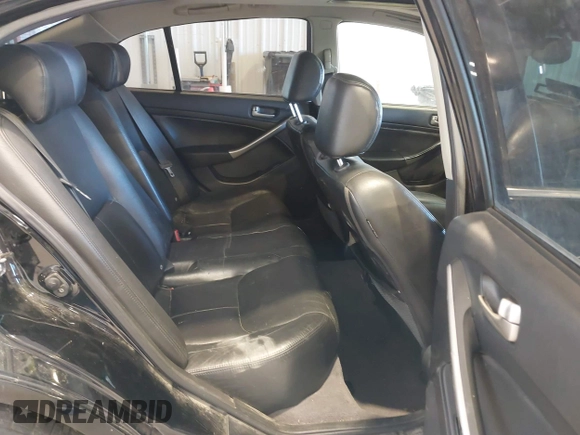 2003 Infiniti G35 w/Leather with VIN JNKCV51E53M304703, listed as a IAAI auction lot 41470321 with 227,894 mi miles. Bid and sale history available at carsss.com. Image 8.