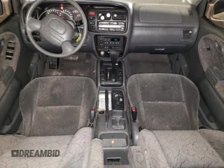 2002 Chevrolet Tracker LT z VIN 2CNBJ634126927635, wystawiony jako Copart lot #78814333 z przebiegiem 224 726 mil mil oraz Szkoda całkowita • Salvage title. Historia ofert i sprzedaży dostępna na DreamBid. Obrazek 8.