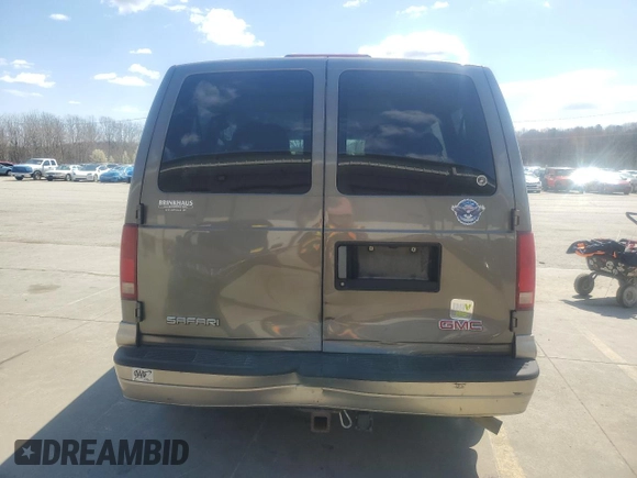 2003 GMC Safari z VIN 1GKDM19XX3B514754, wystawiony jako Copart lot #50744805 z przebiegiem 142 216 mil mil oraz Szkoda całkowita • Salvage title. Historia ofert i sprzedaży dostępna na DreamBid. Obrazek 6.