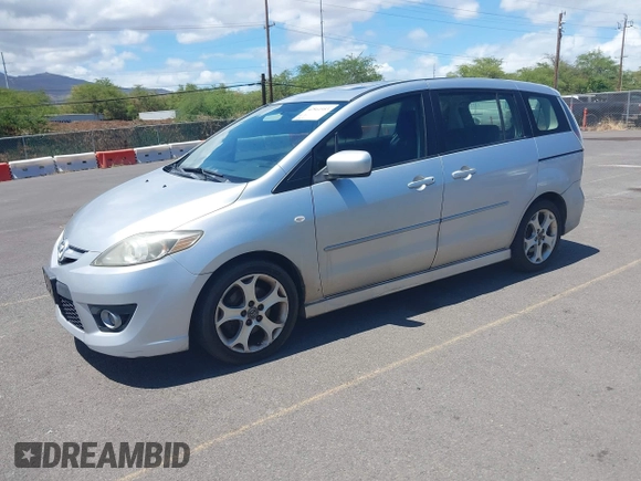 2009 Mazda 5 Sport with VIN JM1CR293990334438, listed as a IAAI auction lot 42561953 with 118,178 mi miles and . Bid and sale history available at DreamBid. Image 2.