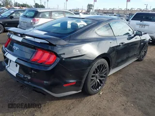 2021 Ford Mustang GT with VIN 1FA6P8CF5M5133808, listed as a IAAI auction lot 41500470 with 43,952 mi miles. Bid and sale history available at carsss.com. Image 4.