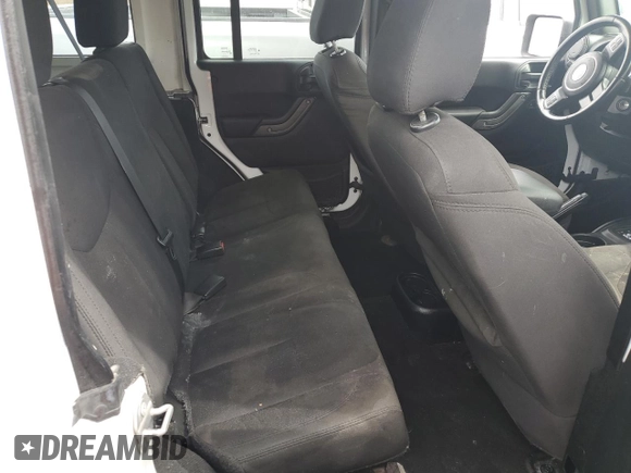 2018 Jeep Wrangler JK Unlimited Sport S with VIN 1C4BJWDG2JL809600, listed as a Copart auction lot 76384474 with 0 mi miles and Non Repairable. Bid and sale history available at carsss.com. Image 11.