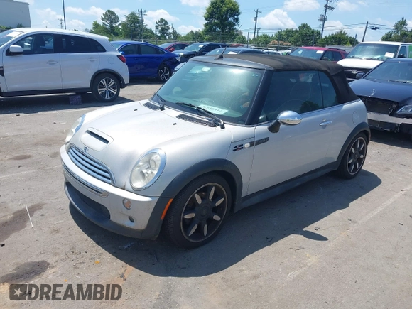 2008 MINI Convertible S with VIN WMWRH335X8TU80600, listed as a IAAI auction lot 42558412 with 105,970 mi miles and . Bid and sale history available at DreamBid. Image 2.