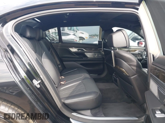 2017 BMW 7 Series 750i with VIN WBA7F0C55HGM21460, listed as a IAAI auction lot 41934198 with 58,206 mi miles and . Bid and sale history available at DreamBid. Image 8.