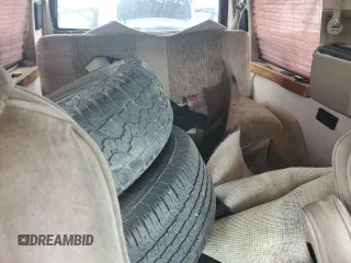 2003 GMC Safari z VIN 1GDEL19XX3B510573, wystawiony jako Copart lot #68429614 z przebiegiem Nie podano mil oraz Szkody całkowita. Historia ofert i sprzedaży dostępna na DreamBid. Obrazek 10.