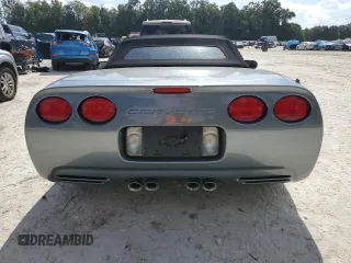 2004 Chevrolet Corvette with VIN 1G1YY32G945124387, listed as a Copart auction lot 77113234 with 59,985 mi miles and Salvage Title. Bid and sale history available at carsss.com. Image 6.