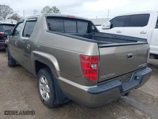 2011 Honda Ridgeline RTS with VIN 5FPYK1F40BB001822, listed as a IAAI auction lot 41448946 with 204,620 mi miles. Bid and sale history available at carsss.com. Image 3.