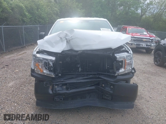 2018 Ford F-150 XL z VIN 1FTFX1E59JKE52129, wystawiony jako IAAI lot #42233231 z przebiegiem 97 262 mil mil oraz . Historia ofert i sprzedaży dostępna na DreamBid. Obrazek 13.