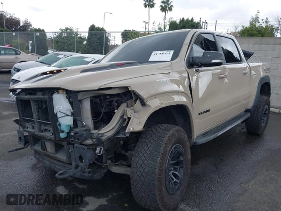 2022 Ram 1500 TRX with VIN 1C6SRFU92NN383774, listed as a IAAI auction lot 41788415 with 34,646 mi miles and . Bid and sale history available at DreamBid. Image 6.
