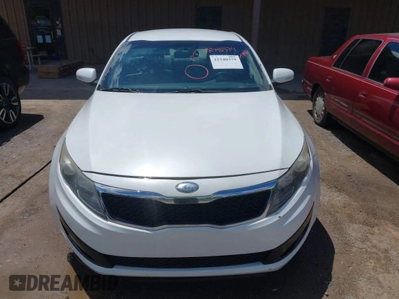 2013 Kia Optima LX z VIN 5XXGM4A7XDG197818, wystawiony jako IAAI lot #42340379 z przebiegiem 185 144 mil mil oraz . Historia ofert i sprzedaży dostępna na DreamBid. Obrazek 6.