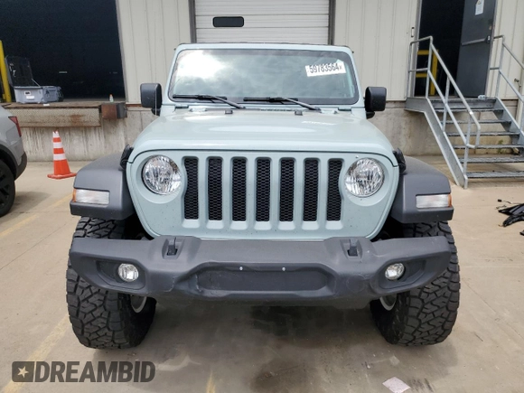 2023 Jeep Wrangler Sport with VIN 1C4HJXDN0PW643485, listed as a Copart auction lot 59783564 with 14,001 mi miles and Salvage Title. Bid and sale history available at DreamBid. Image 5.