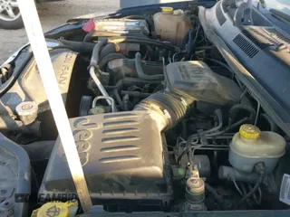 2002 Jeep Grand Cherokee Sport with VIN 1J4GW38S32C181840, listed as a IAAI auction lot 43237876 with 157,878 mi miles and . Bid and sale history available at DreamBid. Image 12.