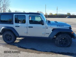2023 Jeep Wrangler z VIN 1C4JJXN62PW628429, wystawiony jako IAAI lot #40861135 z przebiegiem 33 923 mil mil oraz . Historia ofert i sprzedaży dostępna na DreamBid. Obrazek 13.