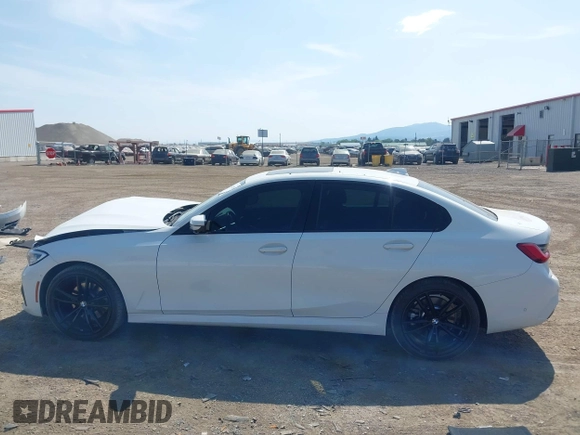 2019 BMW 3 Series 330i xDrive with VIN WBA5R7C52KAJ82760, listed as a IAAI auction lot 42485304 with 43,298 mi miles and . Bid and sale history available at DreamBid. Image 14.