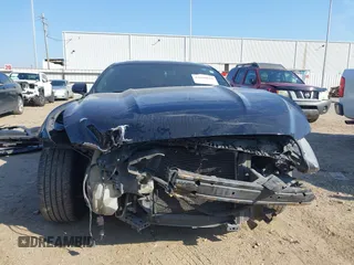 2015 Ford Mustang V6 with VIN 1FA6P8AM4F5349329, listed as a IAAI auction lot 41699016 with 112,008 mi miles and . Bid and sale history available at DreamBid. Image 13.