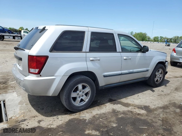 2007 Jeep Grand Cherokee Laredo with VIN 1J8GR48K27C681832, listed as a Copart auction lot 54306725 with 230,673 mi miles and Clean Title. Bid and sale history available at carsss.com. Image 3.