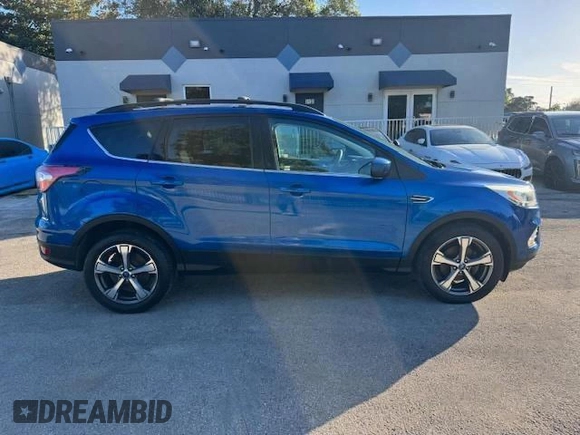 2017 Ford Escape SE with VIN 1FMCU0GD2HUA19806, listed as a Copart auction lot 54800235 with 97,697 mi miles and Salvage Title. Bid and sale history available at carsss.com. Image 13.