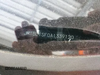 2010 Mazda 3 i Sport z VIN JM1BL1SF0A1339120, wystawiony jako Copart lot #57704395 z przebiegiem Nie podano mil oraz Szkoda całkowita • Salvage title. Historia ofert i sprzedaży dostępna na DreamBid. Obrazek 12.
