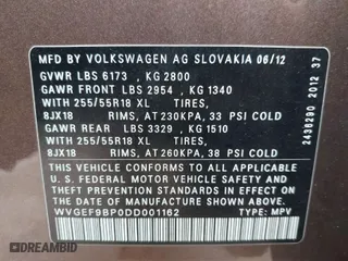2013 Volkswagen Touareg Exec with VIN WVGEF9BP0DD001162, listed as a IAAI auction lot 41539806 with 134,094 mi miles. Bid and sale history available at carsss.com. Image 9.