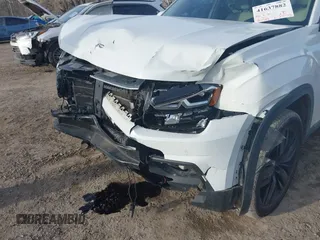 2018 Volkswagen Atlas SEL with VIN 1V2ER2CA5JC586141, listed as a IAAI auction lot 41637882 with 80,515 mi miles and . Bid and sale history available at DreamBid. Image 6.