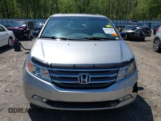 2012 Honda Odyssey Touring with VIN 5FNRL5H96CB043939, listed as a IAAI auction lot 41983643 with 202,535 mi miles. Bid and sale history available at carsss.com. Image 13.