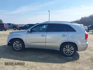 2012 Kia Sorento SX with VIN 5XYKWDA23CG194617, listed as a IAAI auction lot 41504630 with 161,157 mi miles. Bid and sale history available at carsss.com. Image 14.