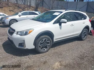 2016 Subaru Crosstrek Premium with VIN JF2GPABC9G8291540, listed as a IAAI auction lot 42102429 with 212,701 mi miles. Bid and sale history available at carsss.com. Image 2.