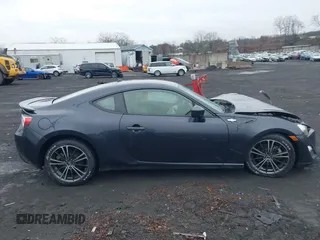 2014 Scion FR-S with VIN JF1ZNAA1XE9706469, listed as a IAAI auction lot 41942773 with 74,641 mi miles and . Bid and sale history available at DreamBid. Image 13.