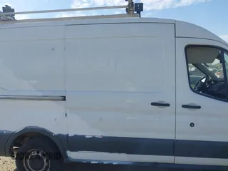 2018 Ford Transit with VIN 1FTYR1CM3JKB05523, listed as a IAAI auction lot 41918124 with 207,984 mi miles and . Bid and sale history available at DreamBid. Image 13.