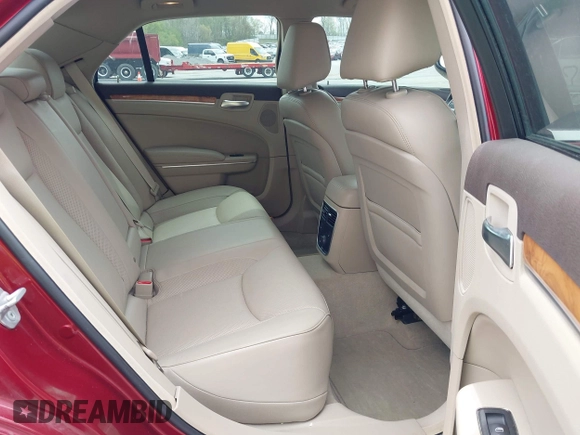 2012 Chrysler 300 C with VIN 2C3CCAKTXCH220185, listed as a IAAI auction lot 42110327 with 57,682 mi miles and . Bid and sale history available at DreamBid. Image 8.