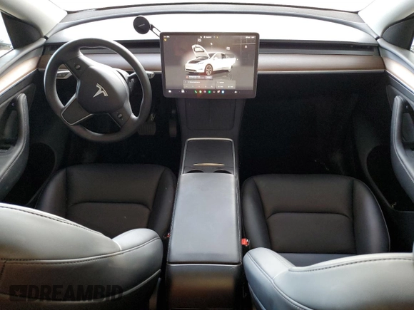 2024 Tesla Model Y Long Range with VIN 7SAYGDEE1RF165311, listed as a Copart auction lot 51711665 with 15,190 mi miles and Salvage Title. Bid and sale history available at DreamBid. Image 8.