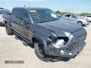 2021 Toyota Tacoma SR5 with VIN 5TFAZ5CN1MX106081, listed as a IAAI auction lot 42231583 with 62,134 mi miles and . Bid and sale history available at DreamBid. Image 1.