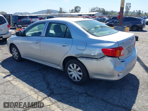2009 Toyota Corolla with VIN JTDBL40E09J007038, listed as a IAAI auction lot 41830758 with 292,897 mi miles. Bid and sale history available at carsss.com. Image 3.