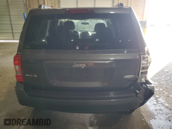 2014 Jeep Patriot Latitude with VIN 1C4NJRFB5ED718711, listed as a Copart auction lot 52100335 with 75,231 mi miles and Clean Title. Bid and sale history available at carsss.com. Image 6.
