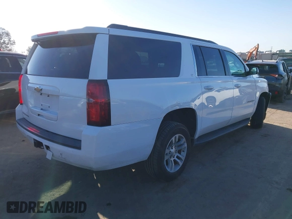 2015 Chevrolet Suburban LT with VIN 1GNSCJKC2FR680413, listed as a IAAI auction lot 41634666 with 127,175 mi miles and . Bid and sale history available at DreamBid. Image 4.