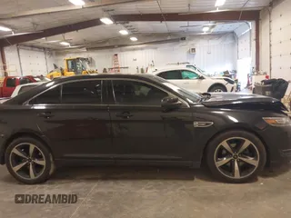2015 Ford Taurus SEL with VIN 1FAHP2H80FG133240, listed as a IAAI auction lot 41897873 with 189,059 mi miles. Bid and sale history available at carsss.com. Image 13.